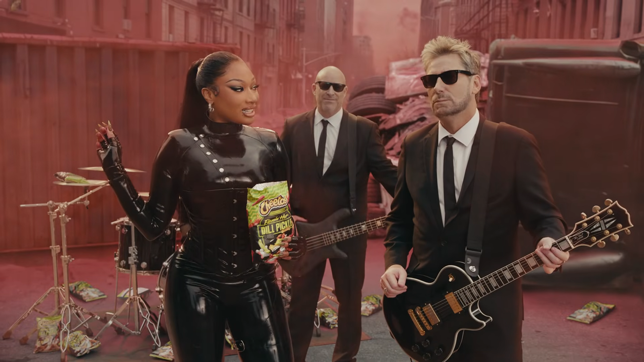 "Dill Pickle's Back!" Shills Nickelback As They Team Up With Megan Thee Stallion To Sell Cheetos® Snacks